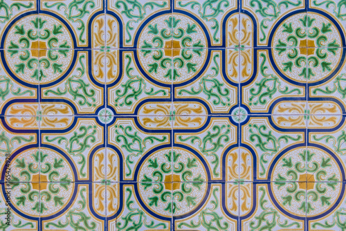     Azulejos, Portugal, detail, orange, green and blue color    © Pascale Gueret