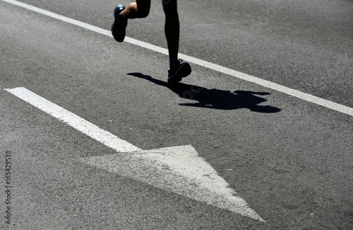 Legs of runner on marathon