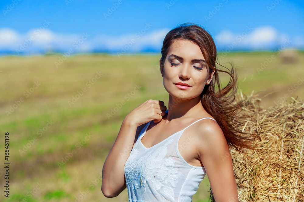 beautiful woman in the  wheat field