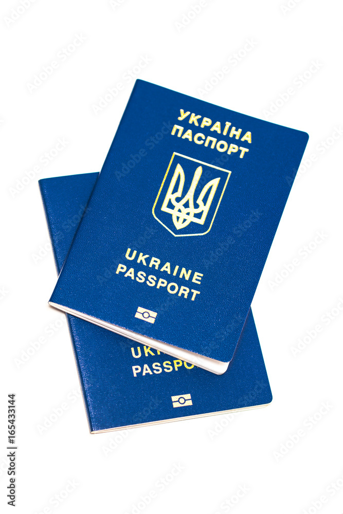 Foreign passport of Ukraine isolated on white background. Ukrainian traveler. The Ukrainian migrant. Visa-free regime for Ukraine Foreign passport of Ukraine isolated on white background. Ukrainian traveler. The Ukrainian migrant. Visa-free regime for Ukraine