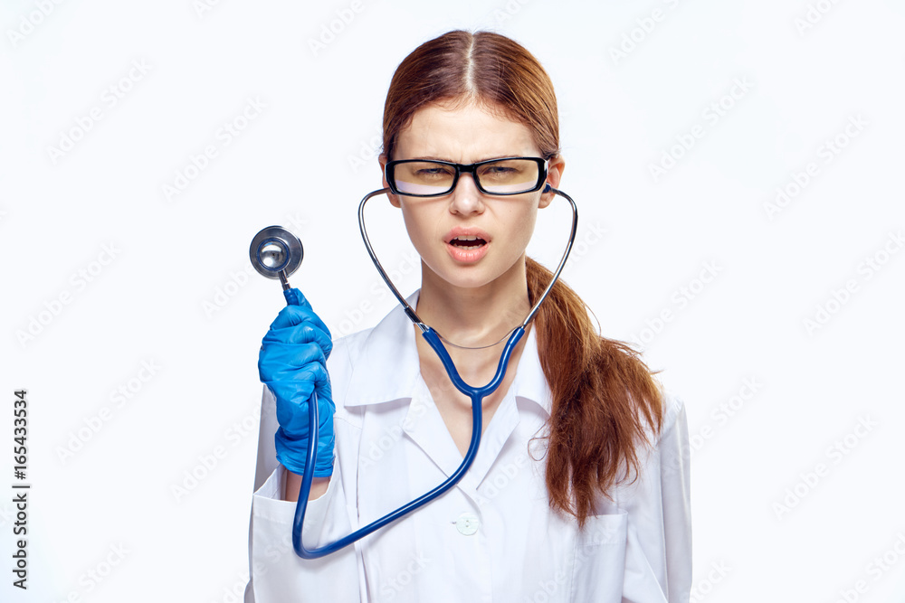 Young beautiful woman on a white isolated background, doctor, scientist, medicine Young beautiful woman on a white isolated background, doctor, scientist, medicine