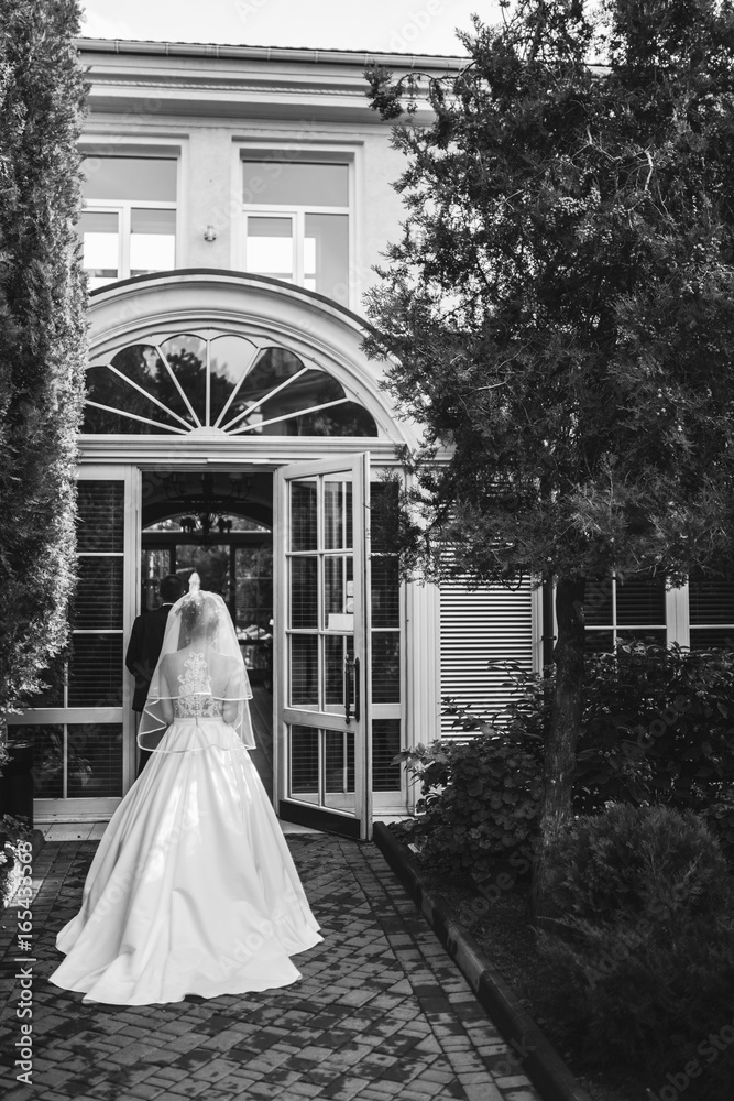 Beautiful wedding couple on a walk outdoor Beautiful wedding couple on a walk outdoor