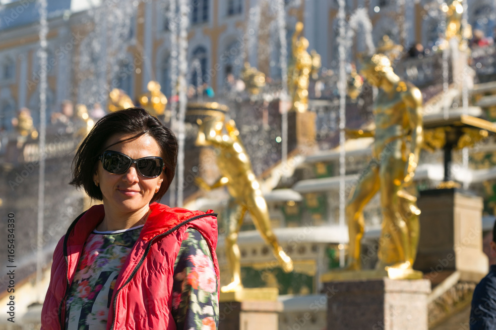 Fototapeta premium Beautiful woman close-up on a strong wind