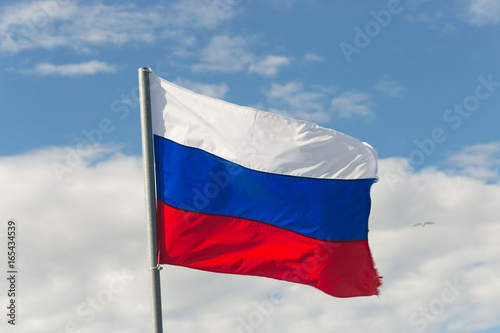 Free Download St. Petersburg, Russia - June 28, 2017: Flag of Russia in the wind in St. Petersburg. - GFXLoad