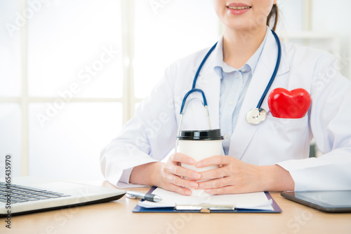 closeup photo of professional smiling doctor woman