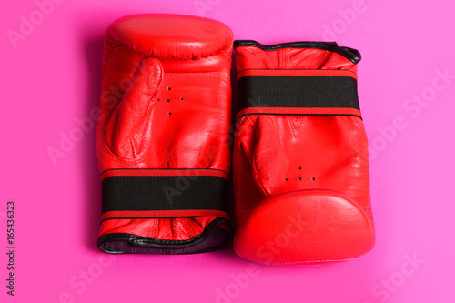 Two gloves for boxing and thai martial arts in red © be free
