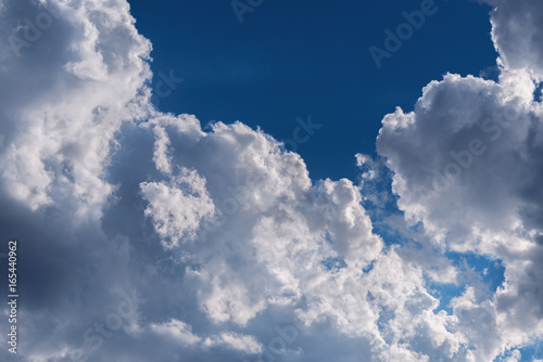 Blue sky with clouds. Nature background.