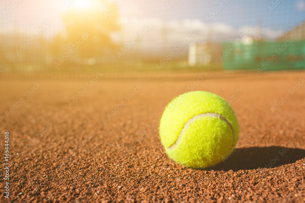 Tennis ball on a court.