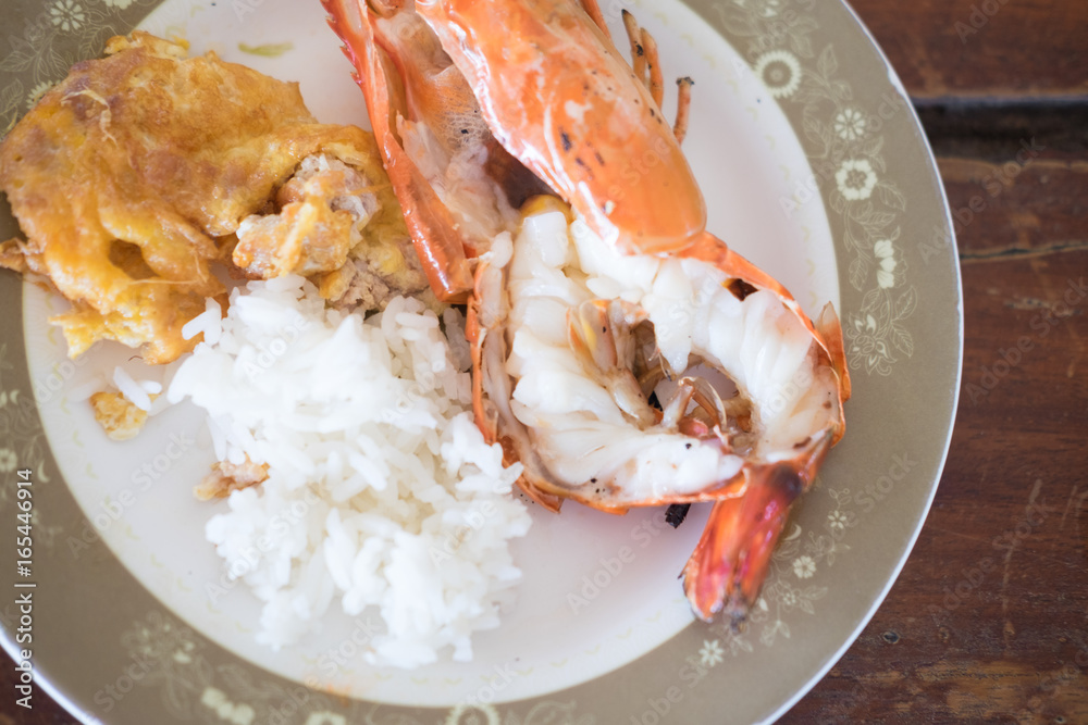 Thai Jasmine rice eating with shrimp and omelet Thai Jasmine rice eating with shrimp and omelet