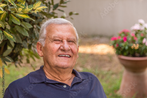 portrait of elderly in garden