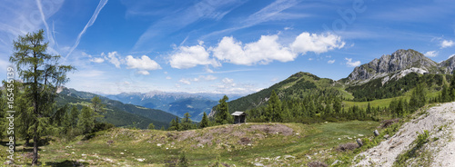 Nassfeld with mountain Gartnerkofel and High Tauern with Grossglockner