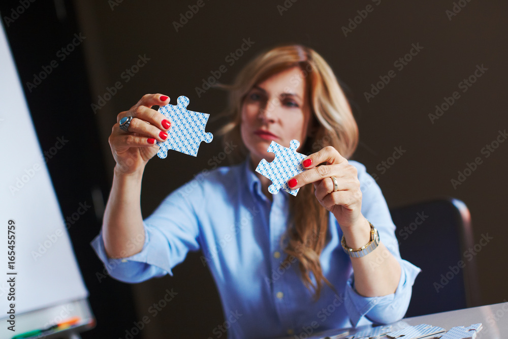 Woman is solving puzzle, conflict situation and problem solution concept
