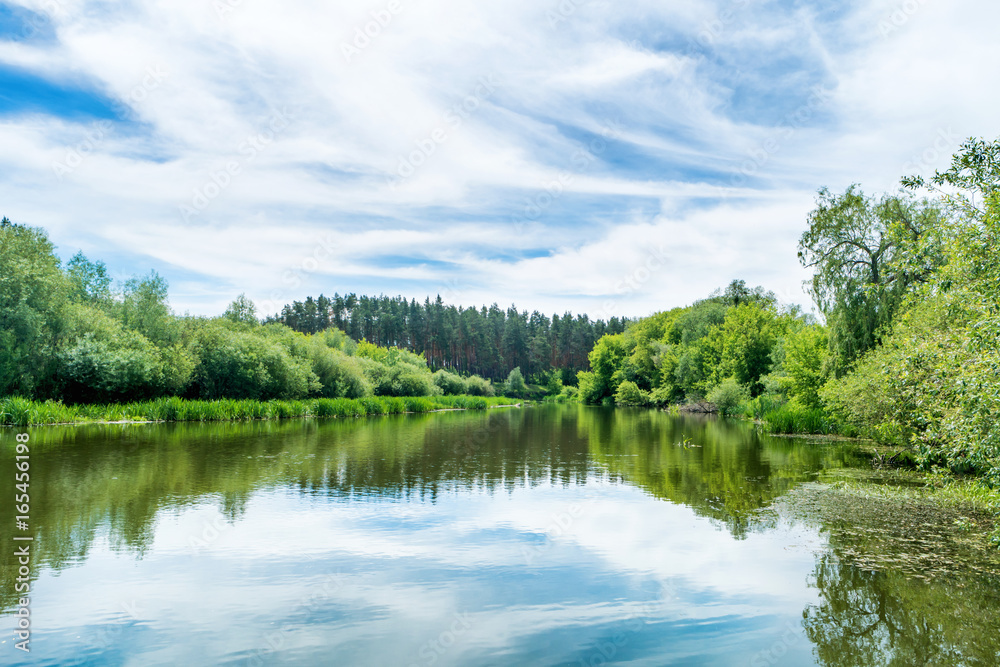 Fototapeta premium Calm landscape with blue river
