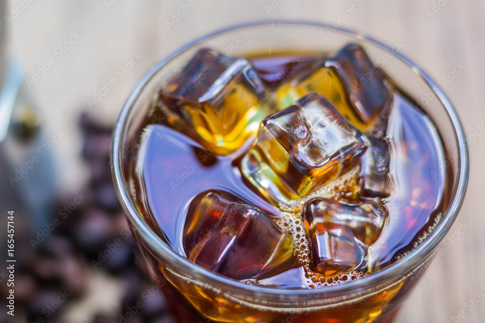 Cold coffee is the old wooden background Cold coffee is the old wooden background