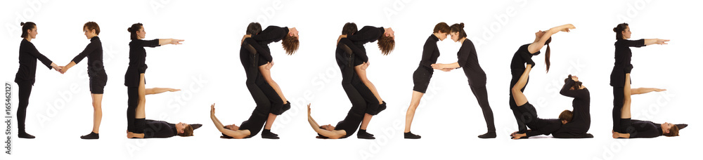 Black dressed people forming MESSAGE word Black dressed people forming MESSAGE word