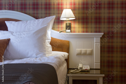 Hotel room - bed with pillo...