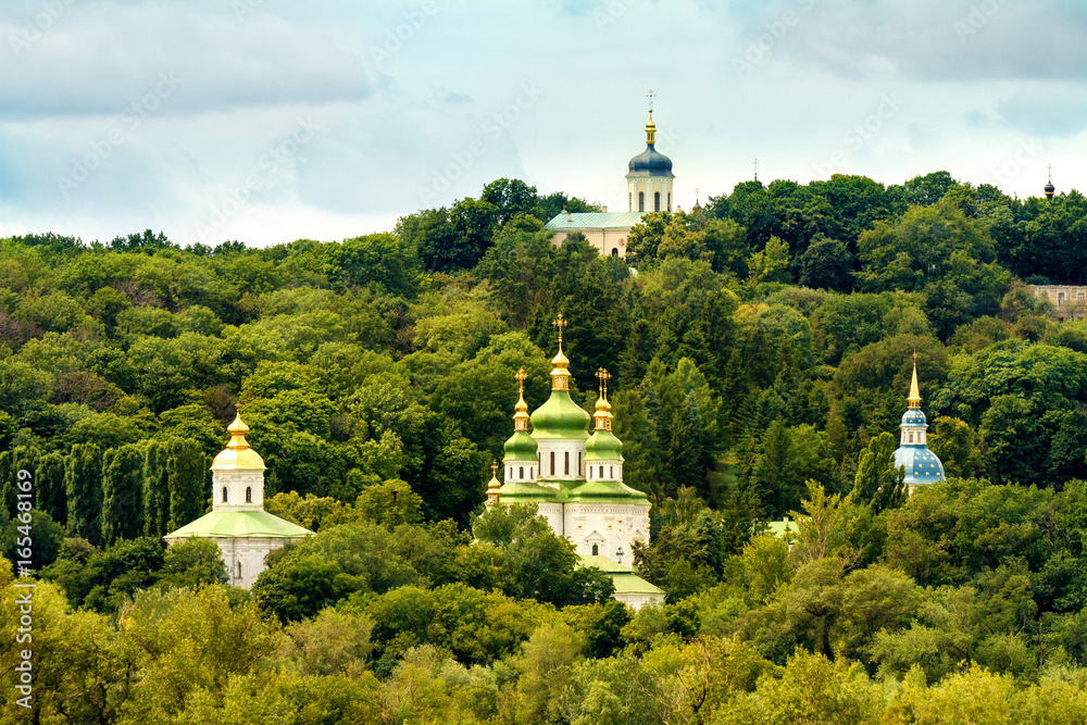 Orthodox church with golden domes and green roof
