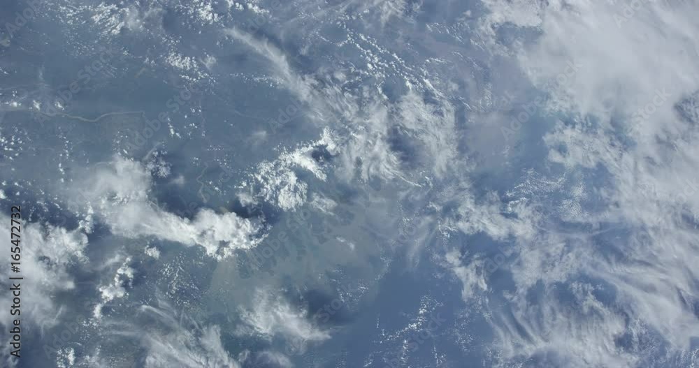 Clouds over Earth landscape, outer space Clouds over Earth landscape, outer space