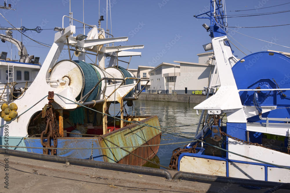 Trawlers in the fishing harbor of La Turballe, a commune in the Loire-Atlantique department in western France.