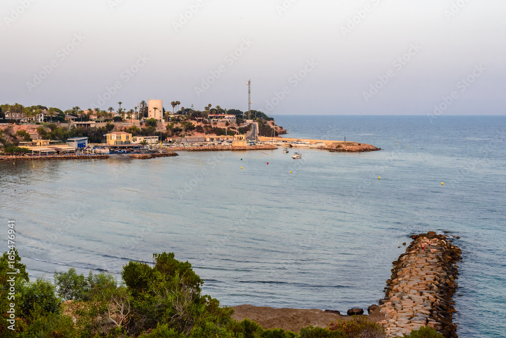 Beach and harbor on the cape