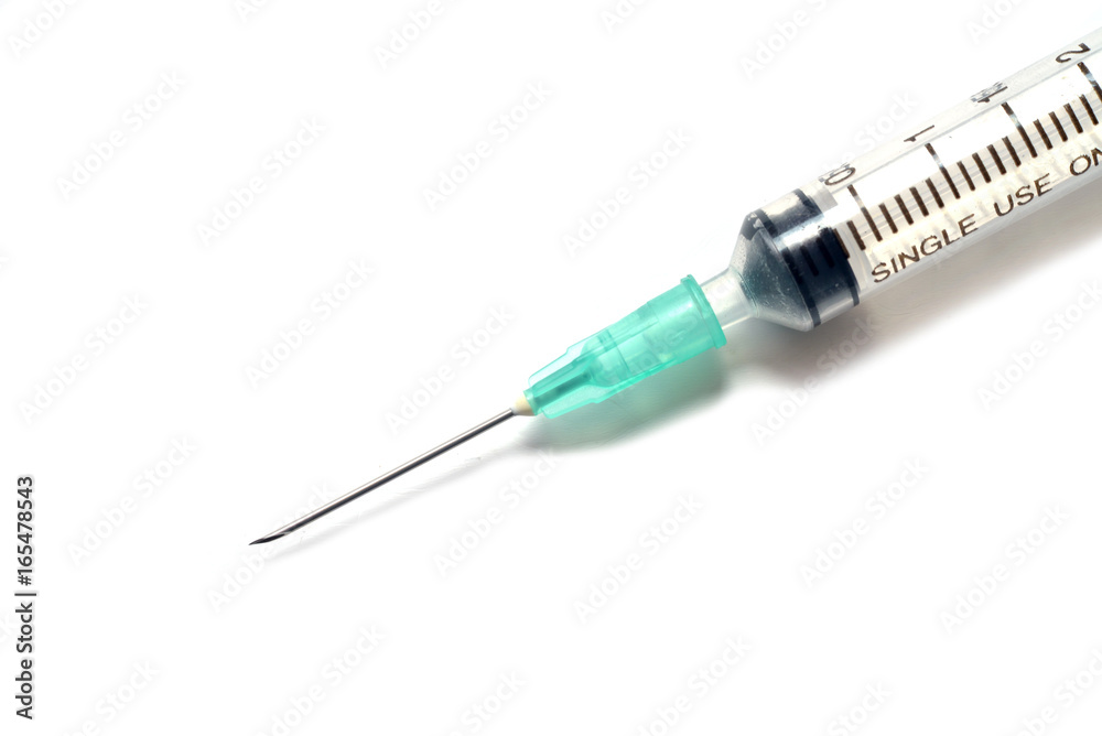 Syringe on a white background Syringe on a white background