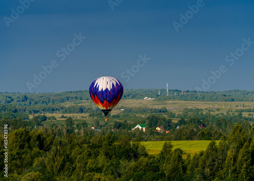 Colorful hot air balloons flying in the blue sky. Balloon Festival — The Golden Ring Of Russia — Pereslavl Zalesskiy.