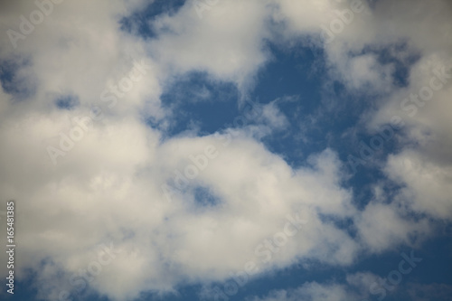 White clouds in summer blue sky © yurchello108