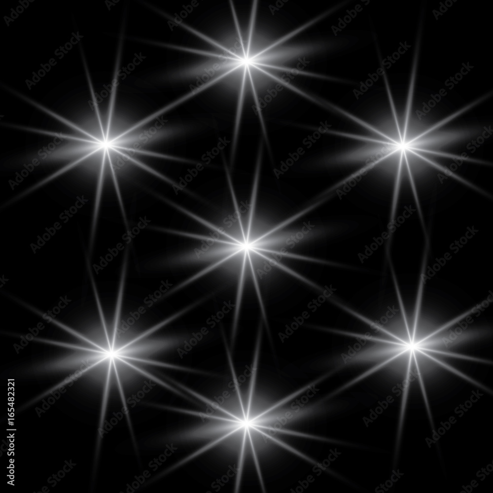 The effect of glowing lights, flash, explosion and stars. Special effect isolated on a dark background.