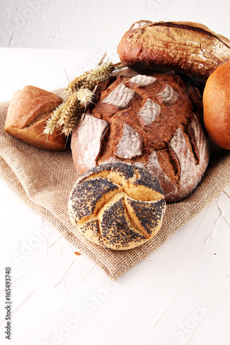 assorted breads isolated on a white background.