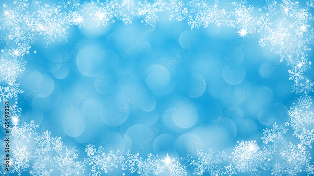 Christmas background with frame of snowflakes and bokeh effect in light blue Christmas background with frame of snowflakes and bokeh effect in light blue