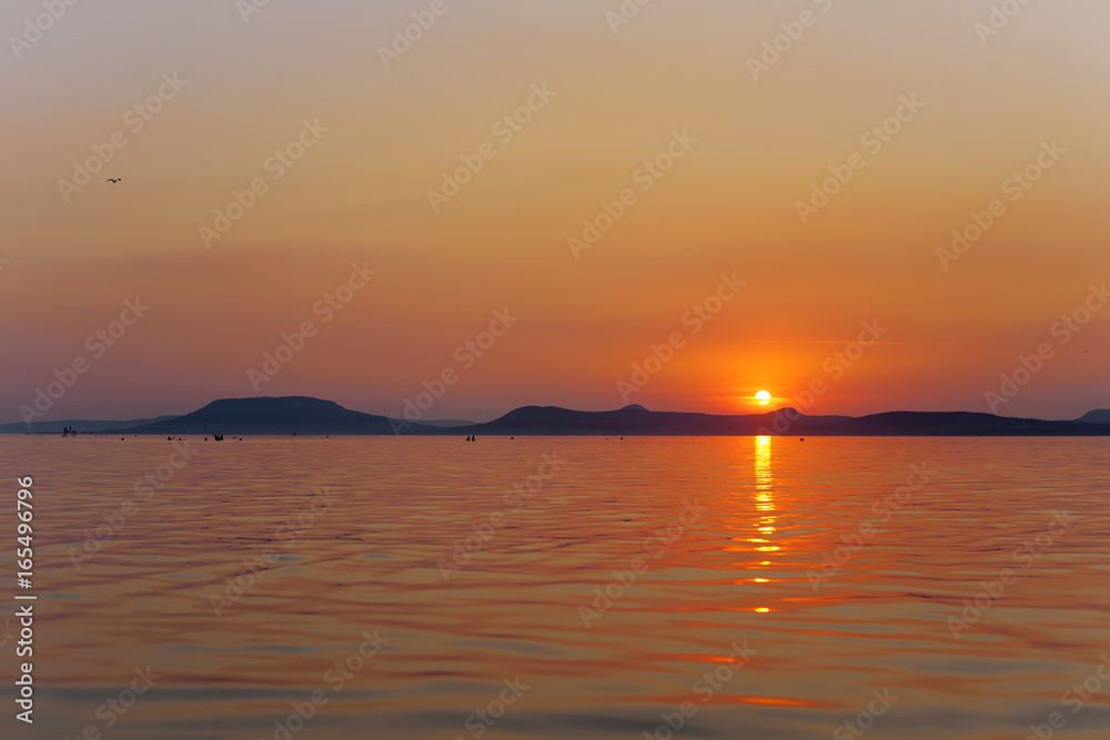 Photo & Art Print Sunset wallpaper of Lake Balaton with Badacsony mountains  in the Bakcground, in