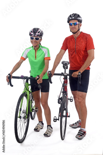 Couple with bike isolated on white