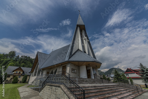 Church in Stromowce Nizne village with blue sky