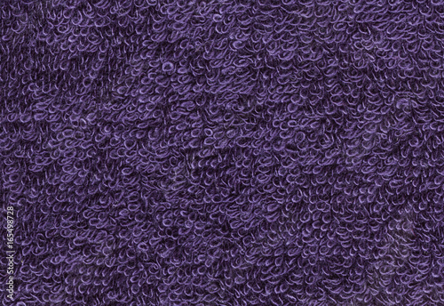 Terrycloth violet, closeup fabric texture background. High resolution