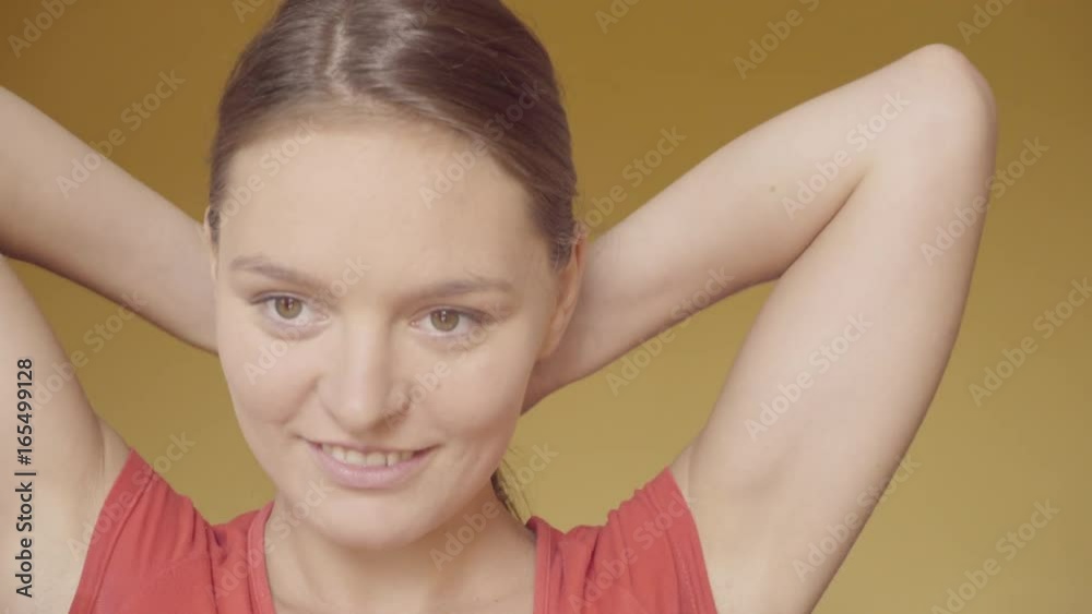 Young woman with no makeup smiling 4K ProRes HQ codec