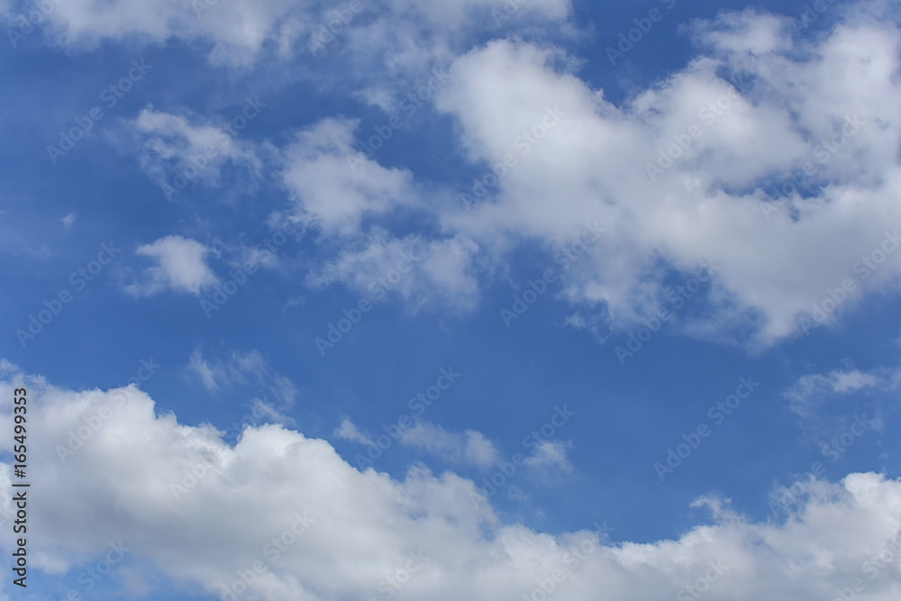 Blue sky with bright white clouds in daylight. Blue sky with bright white clouds in daylight.