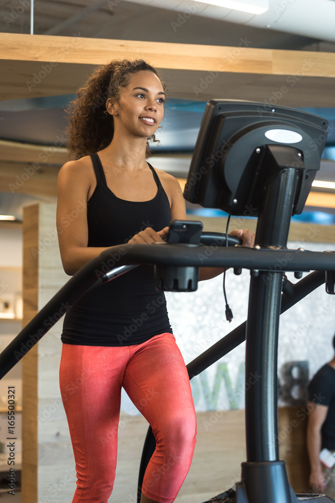 Young Black Woman on Treadmill