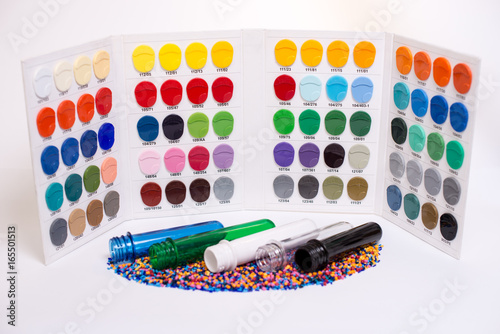 Clear PET Preforms on white background for presentation. Preforms and raw materials of different colors With the Color Picker