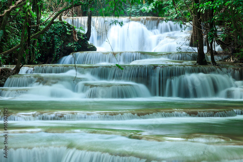 Deep forest waterfall at Huay Mae Kamin waterfall National Park Kanjanaburi Thailand