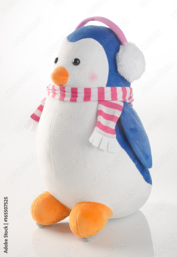 toy or funny handmade toy penguins on background.