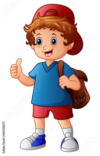 Cute boy in hat and backpack giving thumbs up