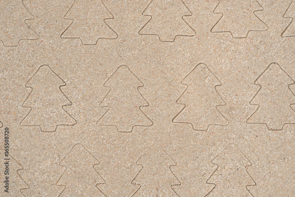 Christmas trees pattern drawing in sand Christmas trees pattern drawing in sand