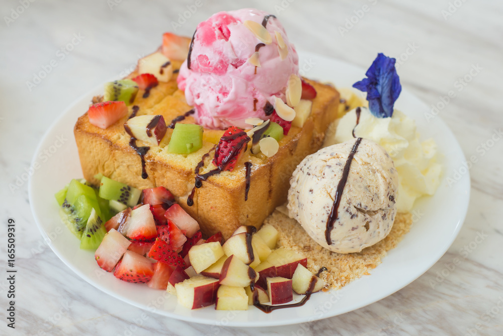 honey toast and ice cream with Mixed Fruit on bread honey toast and ice cream with Mixed Fruit on bread