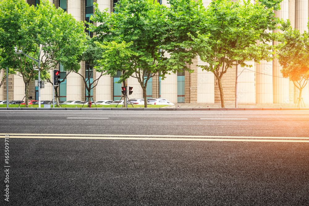 empty asphalt road and modern buildings in shanghai,china.