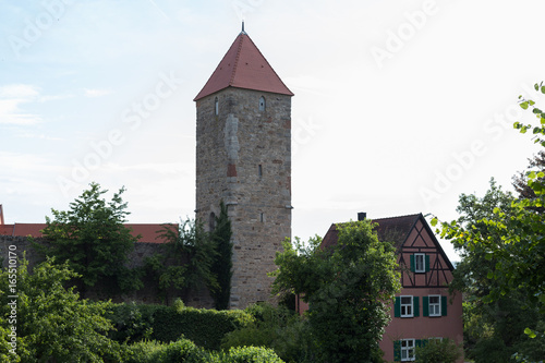 city gate and wall with buildings details photo