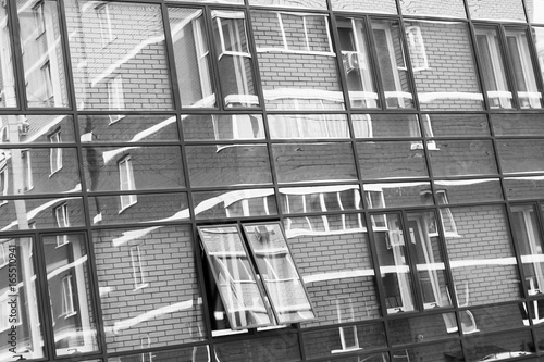 Building with a glass facade, reflections in the glass