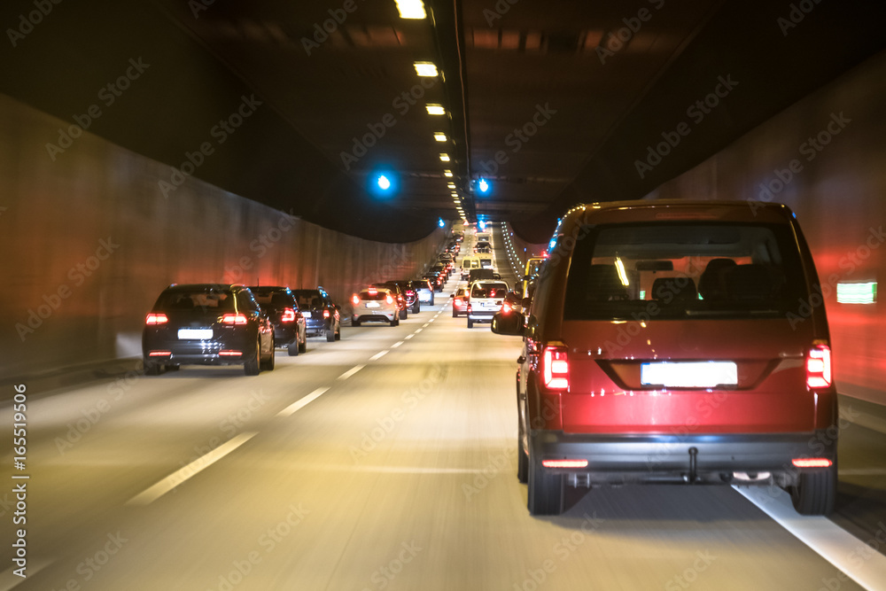 The traffic is queing in the Elbtunnel of the city of Hamburg