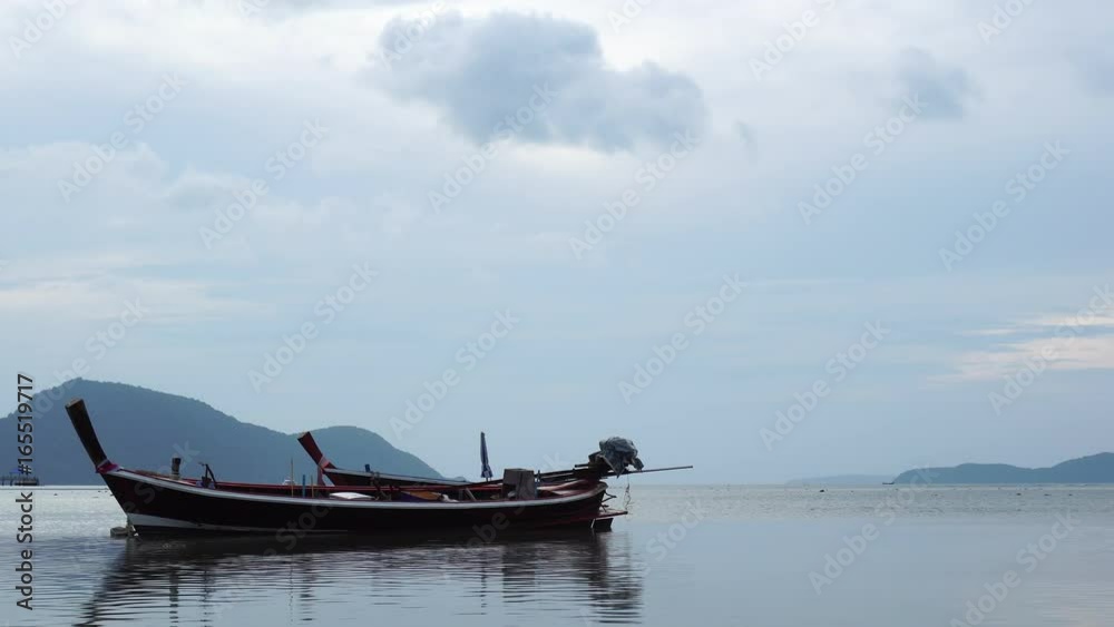 Thai Longtail fisherman boat in tropical andaman sea Phuket Thailand,4K UHD Thai Longtail fisherman boat in tropical andaman sea Phuket Thailand,4K UHD