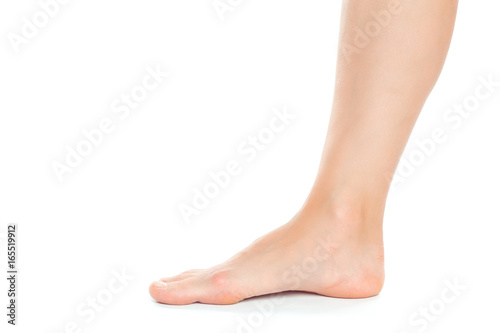 Beautiful women feet isolated on white close-up © fotofabrika