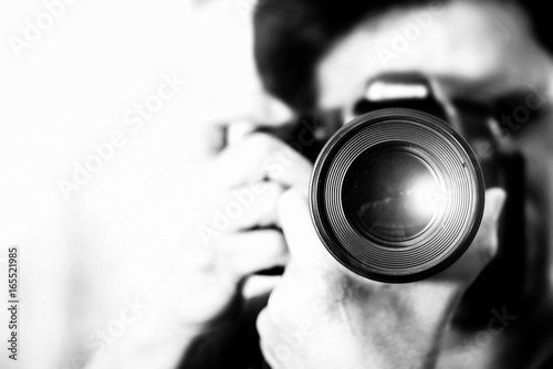 Close up image Turn off the camera with a digital camera / blur.f a photographer taking pictures with a digital camera / old color scheme.